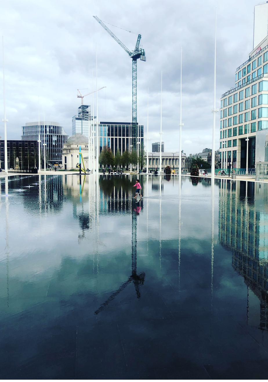Reflecting pool and city skyline, Birmingham